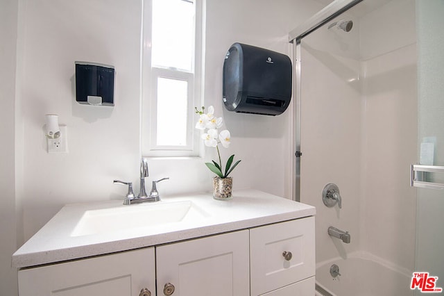 bathroom with vanity and shower / bathtub combination