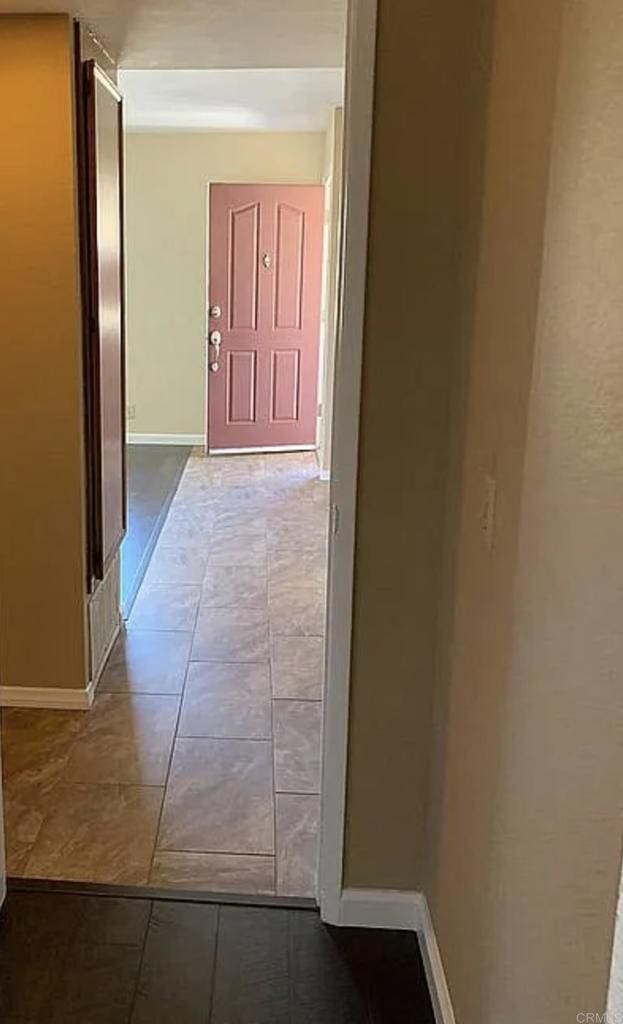 corridor with tile patterned floors