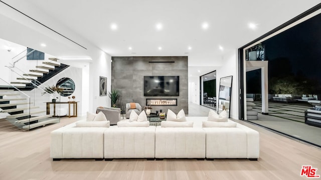 living room with light hardwood / wood-style flooring