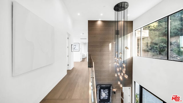 hallway with wood-type flooring