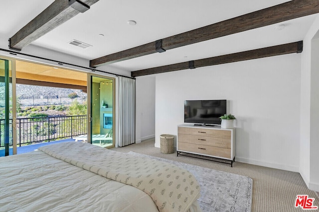 bedroom with beam ceiling, access to exterior, and light carpet