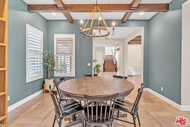 dining space featuring light tile patterned flooring, beam ceiling, a notable chandelier, and coffered ceiling