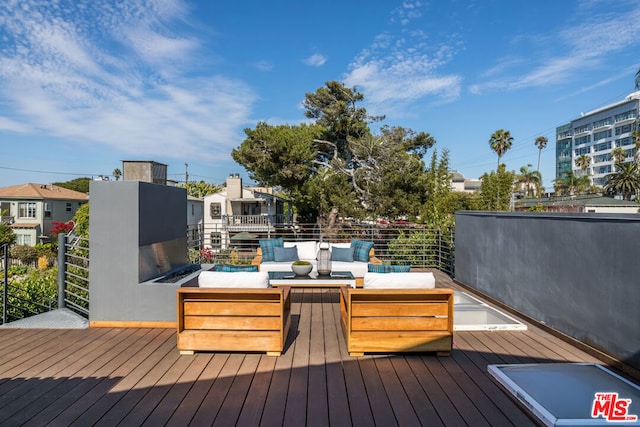 deck with outdoor lounge area