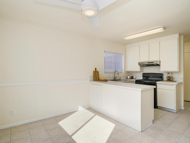 kitchen featuring black range with electric stovetop, white cabinets, and light tile patterned floors