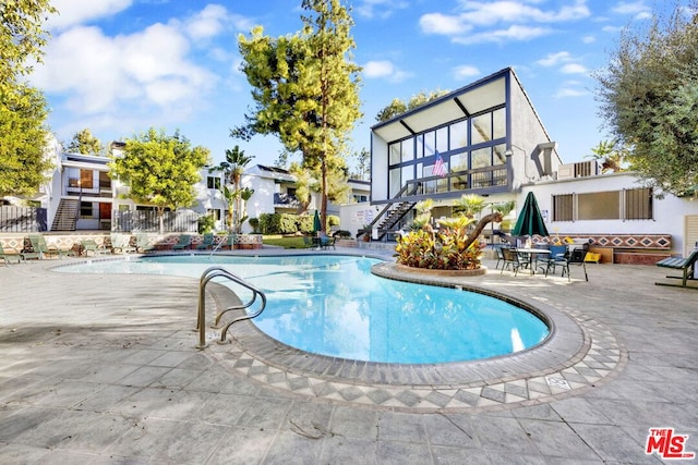 view of pool with a patio