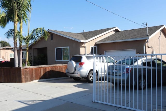 single story home with a garage