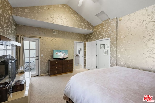 carpeted bedroom featuring ceiling fan, access to exterior, high vaulted ceiling, and ensuite bath