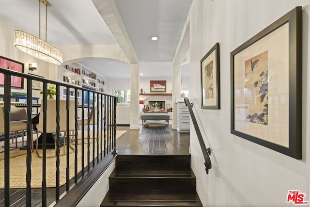 stairway featuring hardwood / wood-style floors