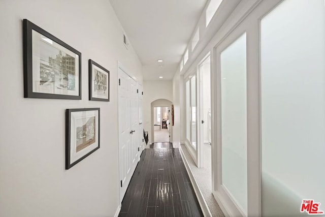 hall featuring dark hardwood / wood-style floors