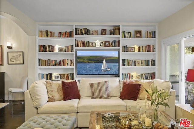 sitting room featuring hardwood / wood-style floors