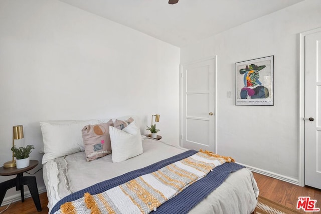 bedroom featuring hardwood / wood-style floors