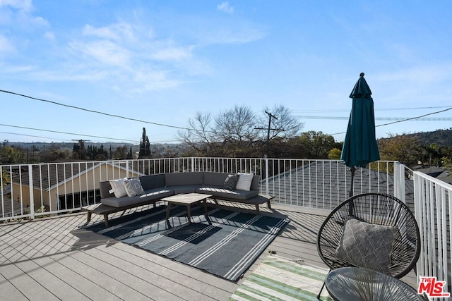 deck with an outdoor living space