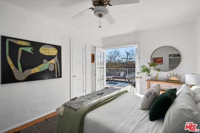 bedroom featuring access to outside, ceiling fan, and wood-type flooring