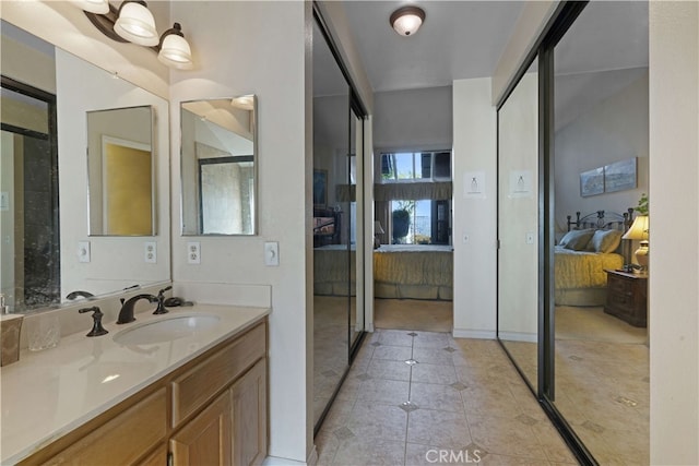 bathroom featuring vanity and tile patterned flooring