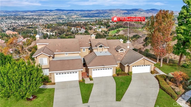 aerial view featuring a mountain view