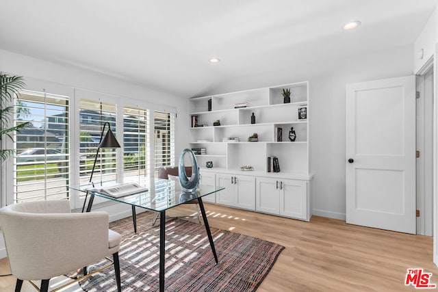 office with light hardwood / wood-style floors