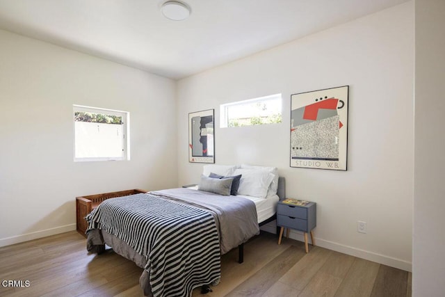 bedroom featuring light hardwood / wood-style floors