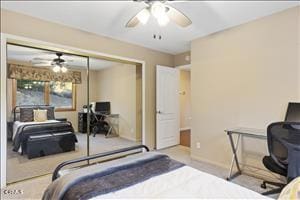 bedroom featuring ceiling fan and a closet