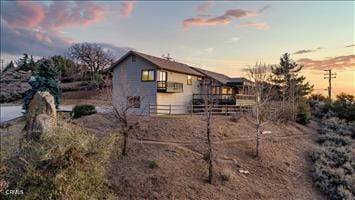 view of property exterior at dusk