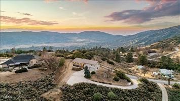 aerial view at dusk with a mountain view