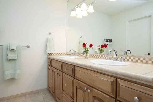 bathroom with vanity and tile patterned floors