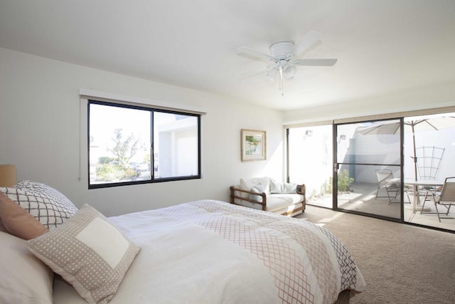 bedroom with carpet floors, access to outside, and ceiling fan