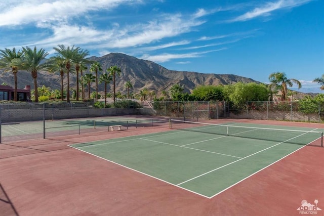 view of sport court with a mountain view