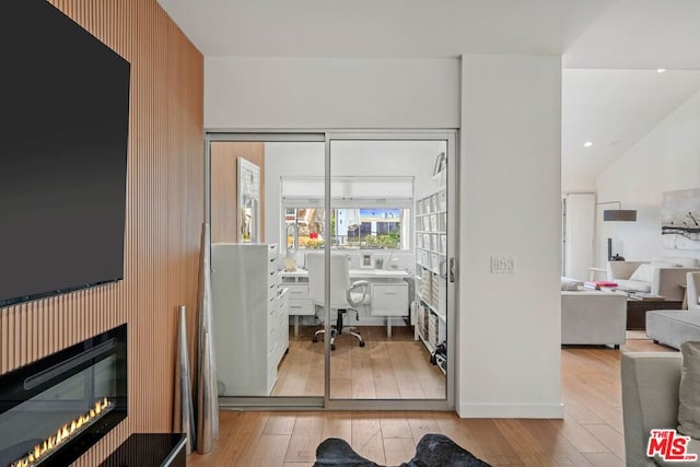 office space with light wood-type flooring