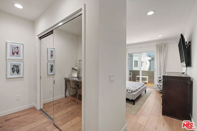 interior space featuring light hardwood / wood-style floors and a closet