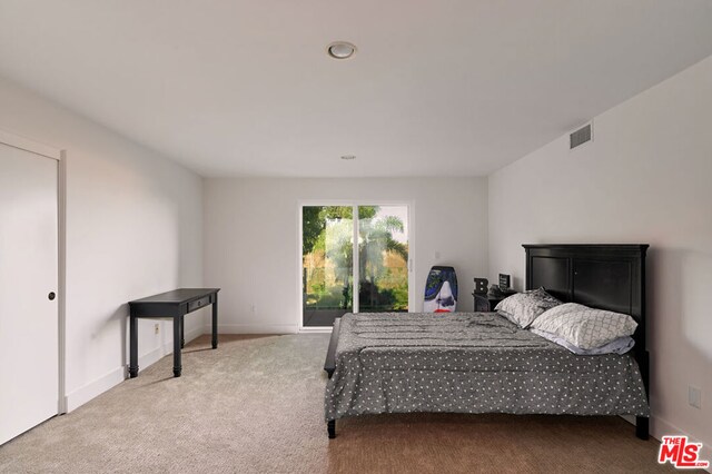 bedroom featuring carpet flooring