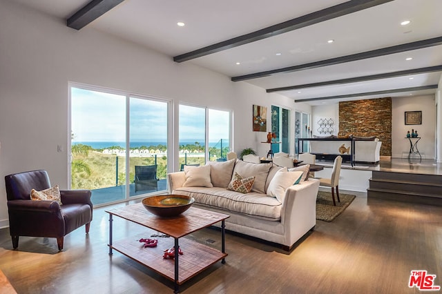 living room featuring beam ceiling and hardwood / wood-style flooring