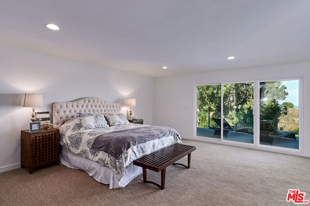 carpeted bedroom with access to exterior