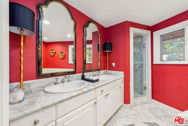 bathroom with vanity and an enclosed shower