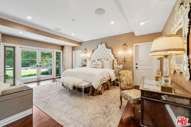 bedroom with access to exterior, french doors, and dark hardwood / wood-style floors