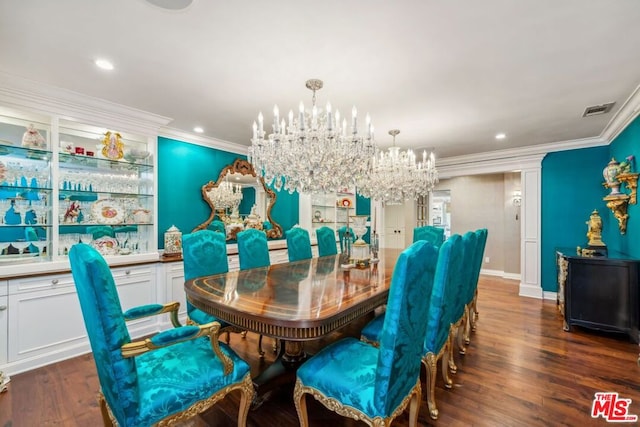 dining room featuring a notable chandelier, crown molding, and dark wood-type flooring