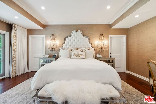 bedroom with dark hardwood / wood-style floors and ornamental molding