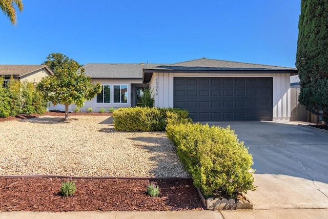 ranch-style home with a garage