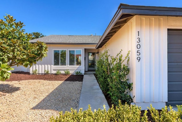 entrance to property featuring a garage