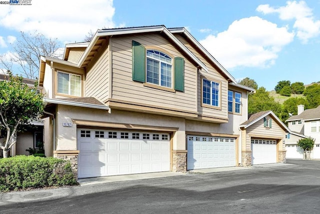 view of front of property with a garage