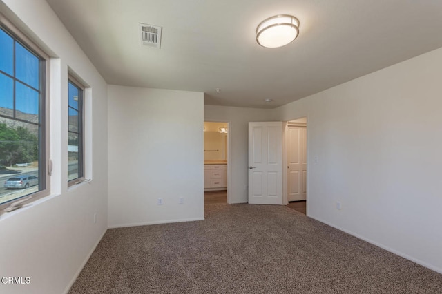 view of carpeted spare room