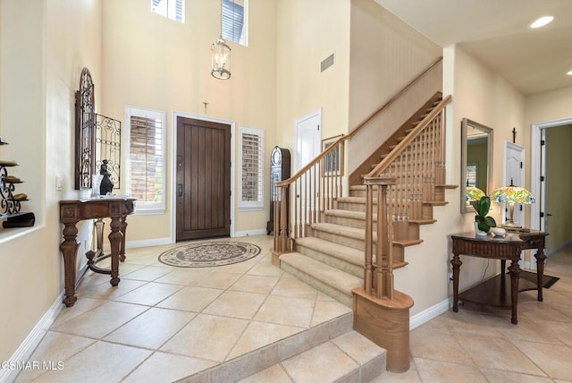 foyer entrance featuring a high ceiling