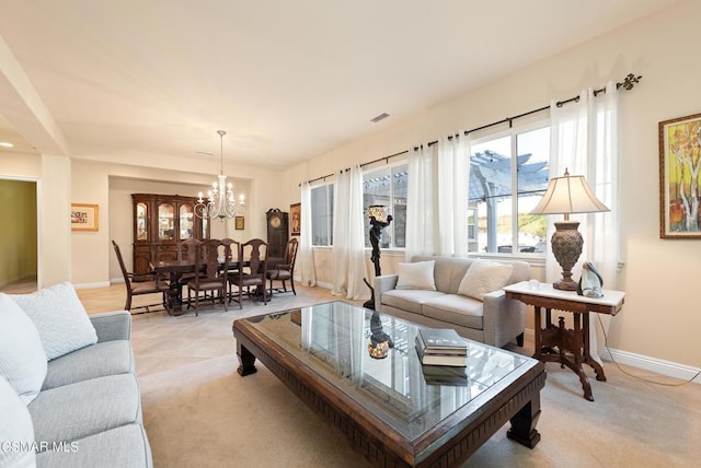 living room featuring a chandelier