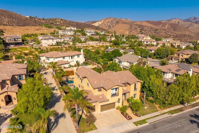 bird's eye view with a mountain view