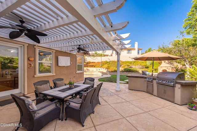 view of patio / terrace with area for grilling, a pergola, and grilling area