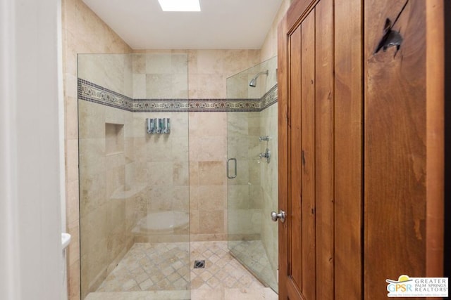 bathroom featuring an enclosed shower