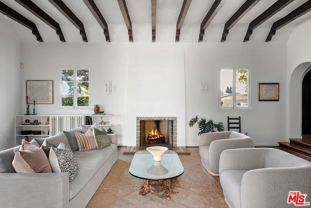 living room with beamed ceiling