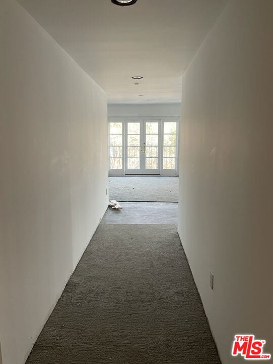 hallway with carpet