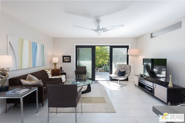 living room with light tile patterned floors and ceiling fan