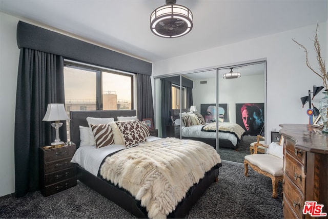 bedroom featuring carpet floors and a closet