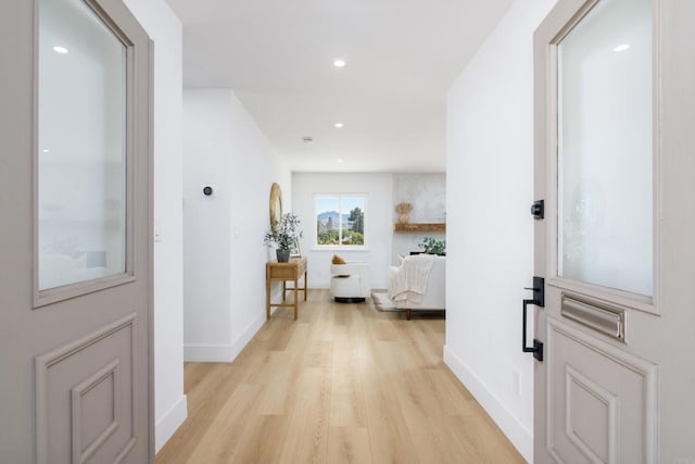 hall featuring light wood-type flooring